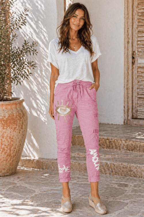 Jegging pants with writing and Gold Eye