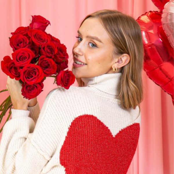 Love is in the air turtle neck heart sweater