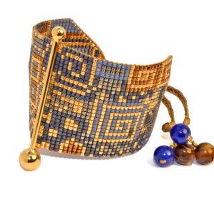 FINE ART BRACELET IN GOLD, BRONZE, METALLIC BLUE AND GUNMETAL